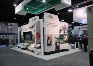 Exhibition booth showcasing IMI's innovative defense and survival solutions.
